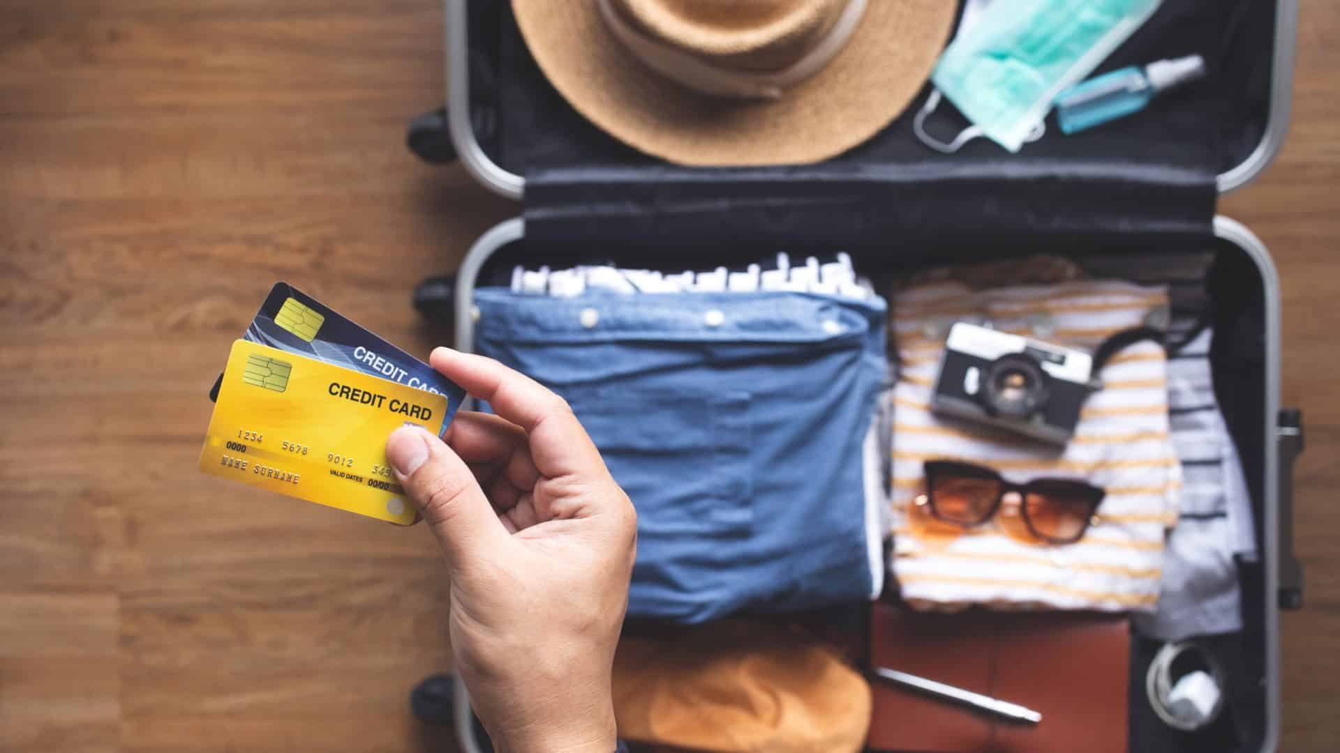 Young Person Using Credit Cards For Payment On Vacation Or Holiday Trip.convenient Lifestyle With Technology.