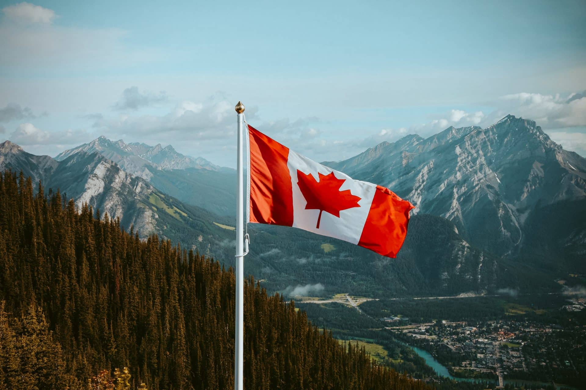 Canadian Flag In The Mountains