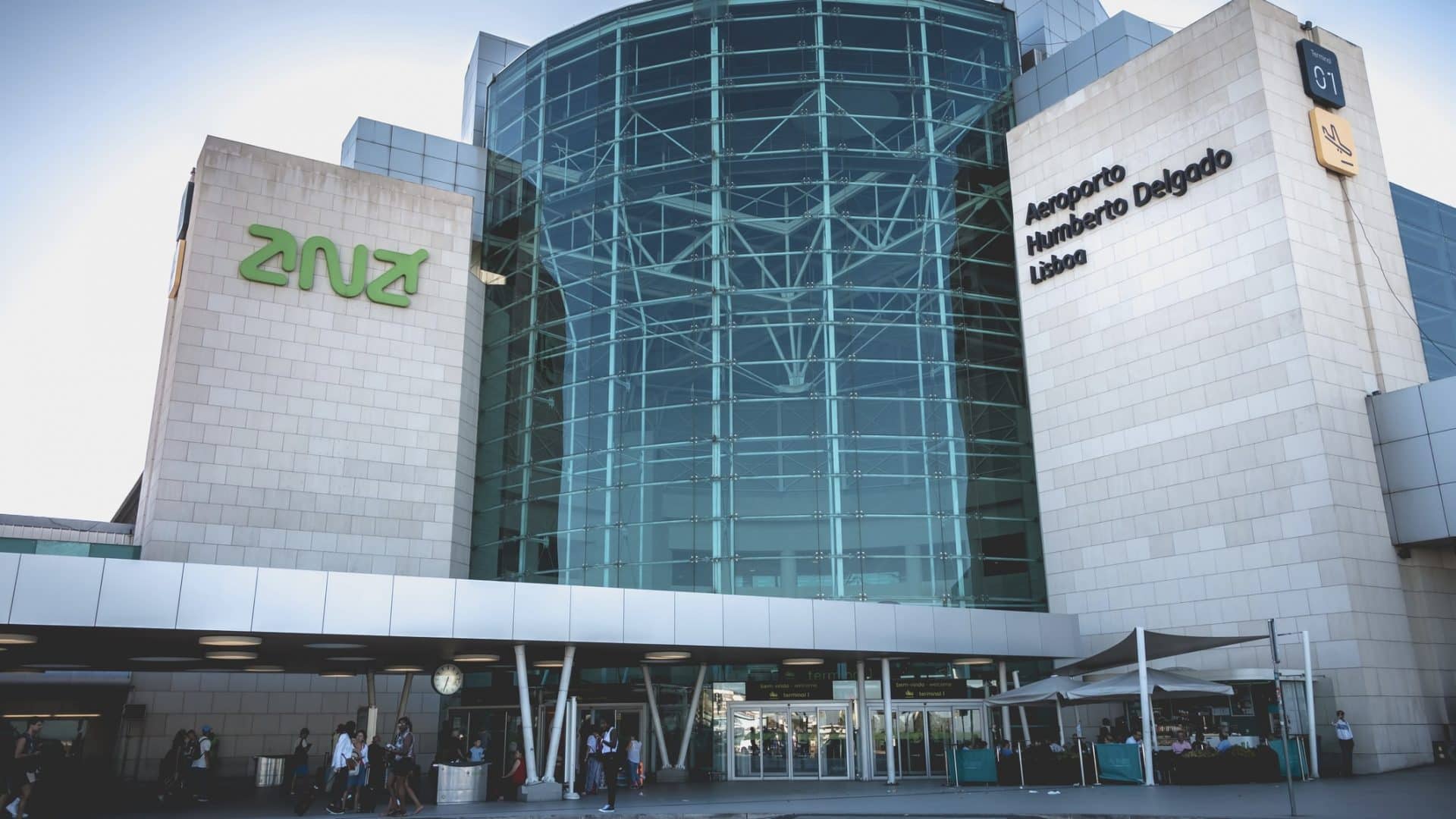 Exterior View Of Lisbon International Airport Where Travelers Walk