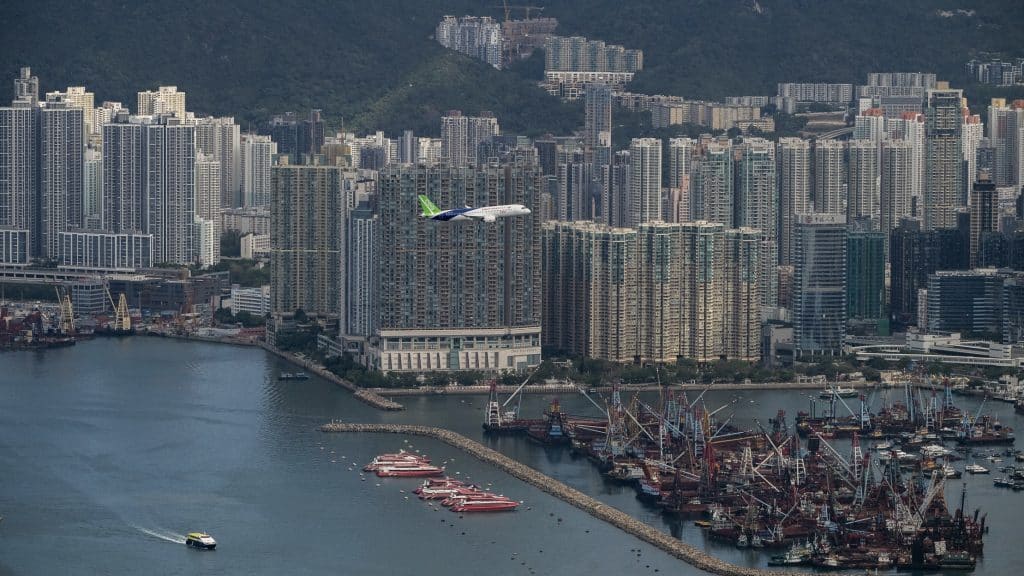 China Developed Aircraft C919 Flies Over Hong Kong's Victoria Harbour