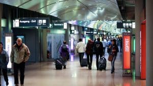 Interior Of Hamburg International Airport Terminal With Crowd Of People In Hallway