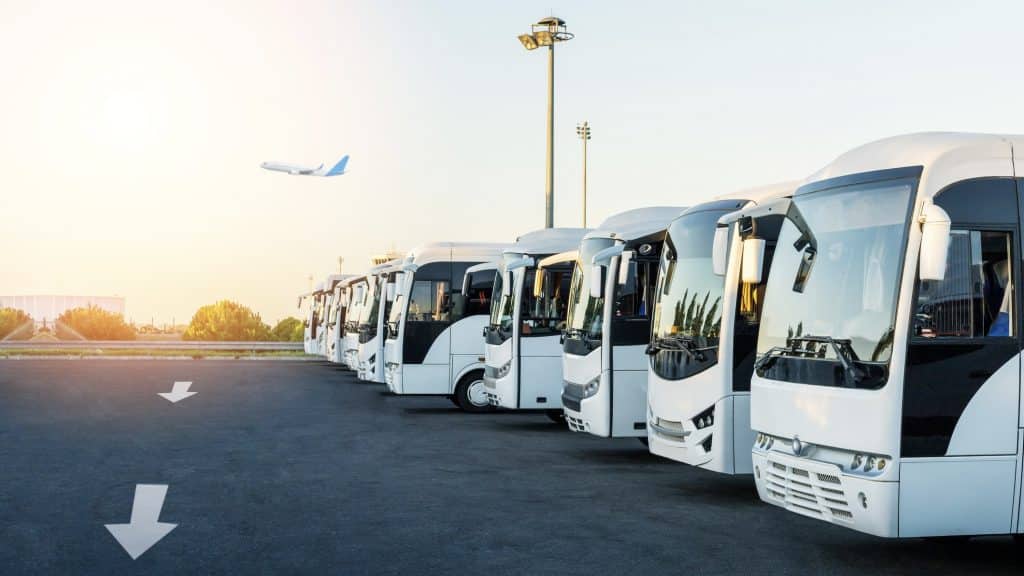 Buses At The Parking Lot Of The Airport At Sunrise. Holiday, Travel, Tourism And Vacation Concept.