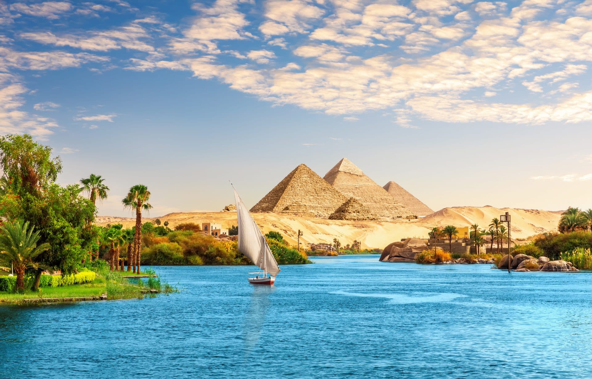 Beautiful Nile Scenery With Sailboat In The Nile On The Way To Pyramids, Aswan, Egypt