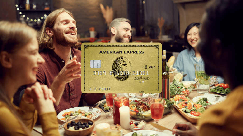 The Amex gold card in front of smiling people