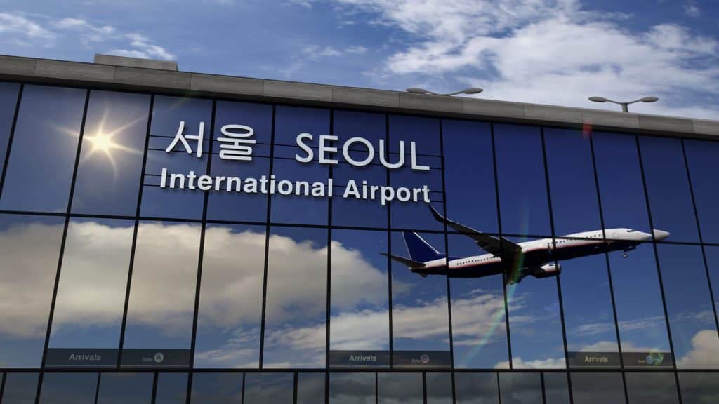 Airplane Landing At Seoul Mirrored In Terminal