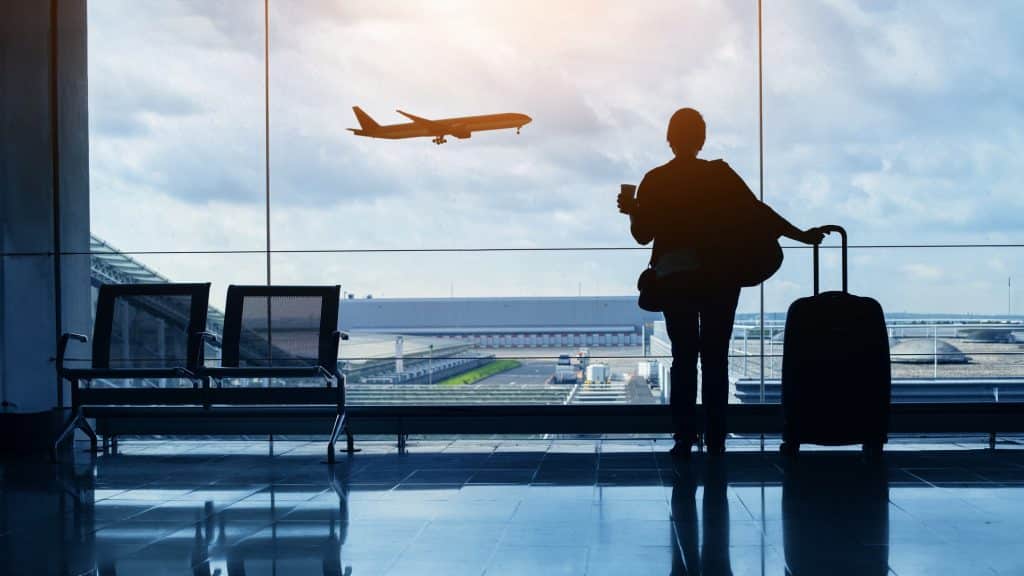 Travel By Plane, Woman Passenger Waiting In Airport, Silhouette Of Passenger In Airport