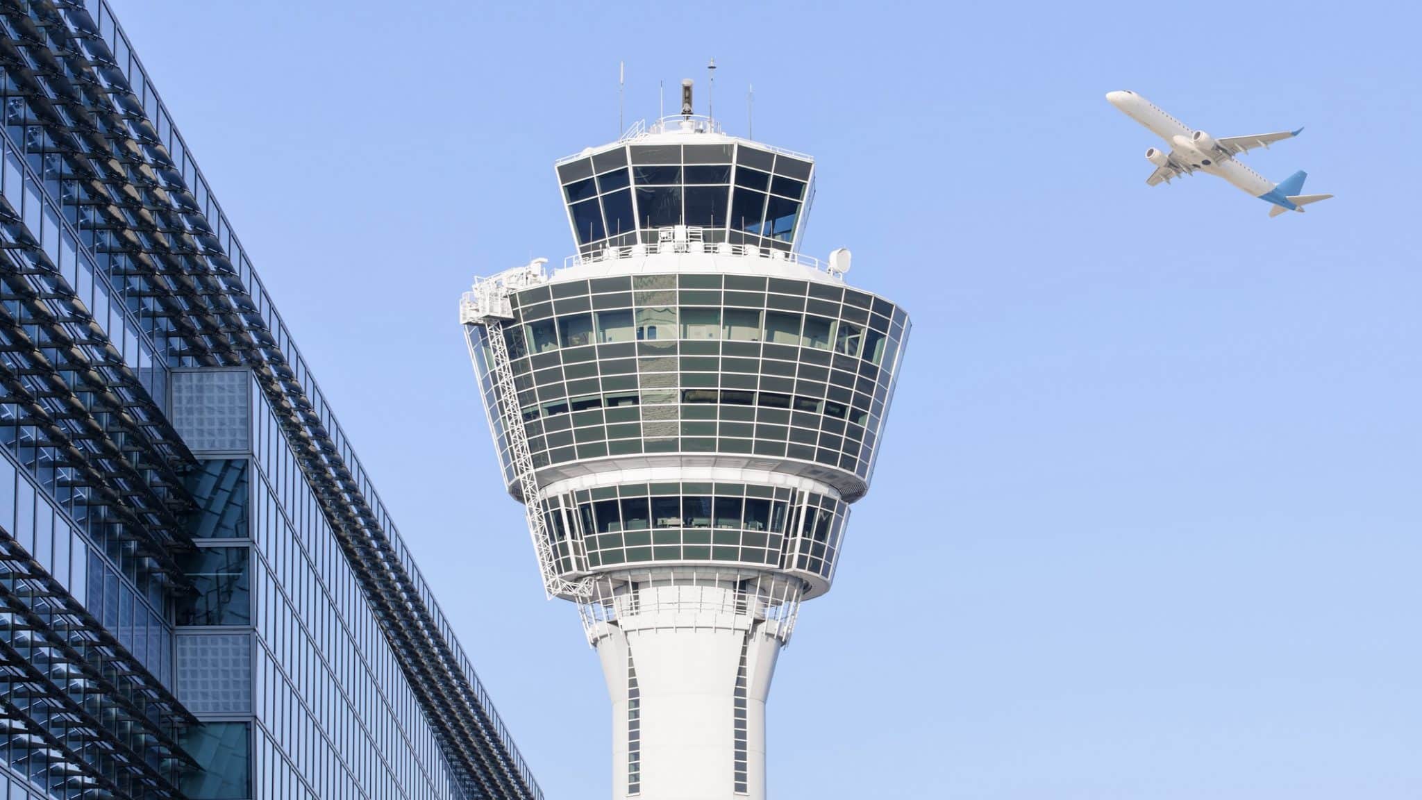 Munich International Airport Control Tower And Departing Taking Off