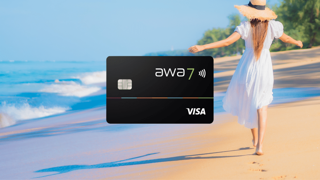 awa7 credit card in the foreground, in the background a woman on the beach