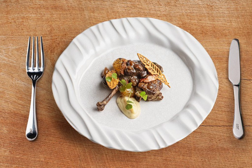 LOT Business Class Menue Artur Skotarczyk Perlhuhn Gericht