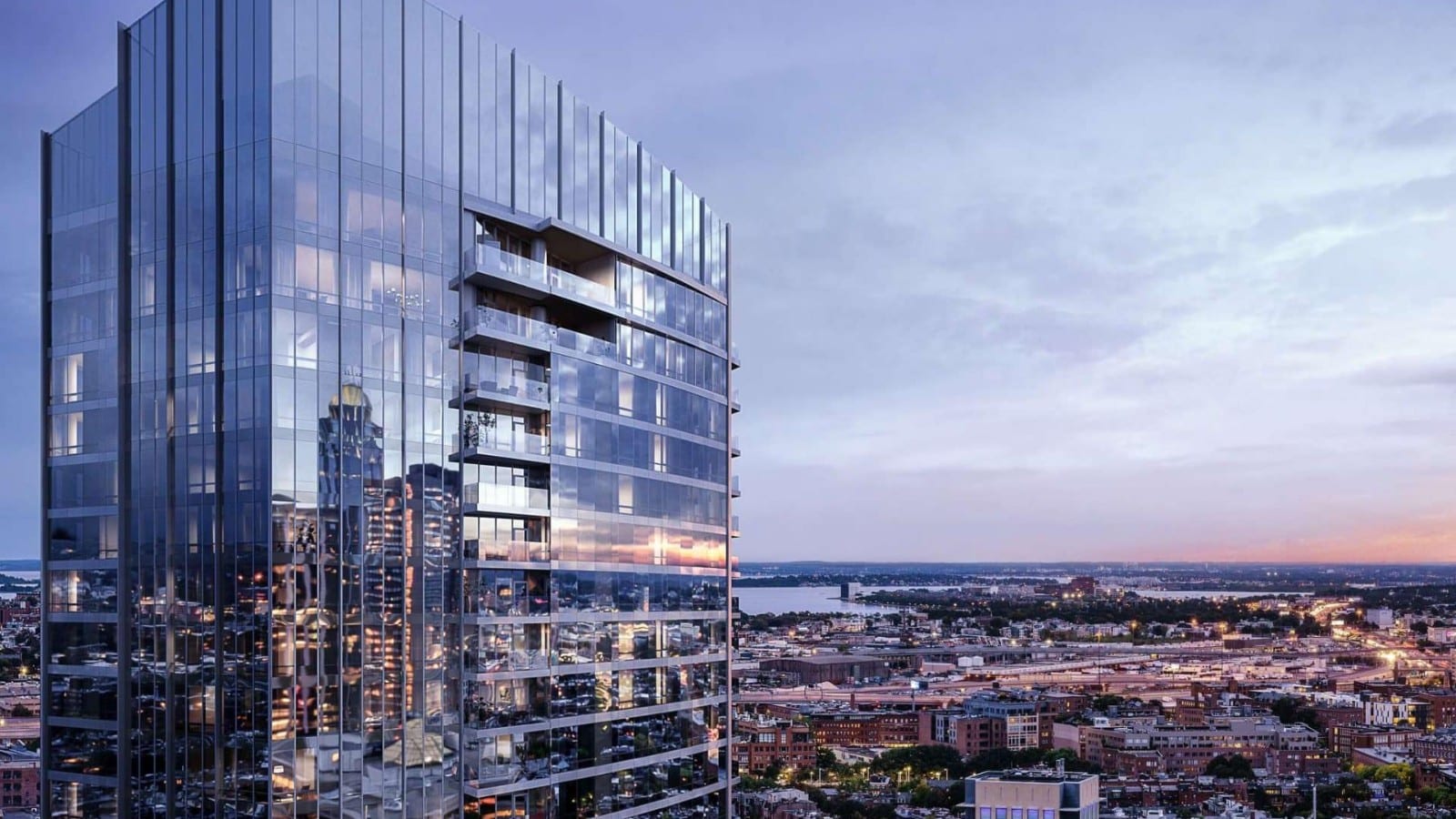 Glasturm des Raffles Boston in der Abenddaemmerung ueber der Back Bay